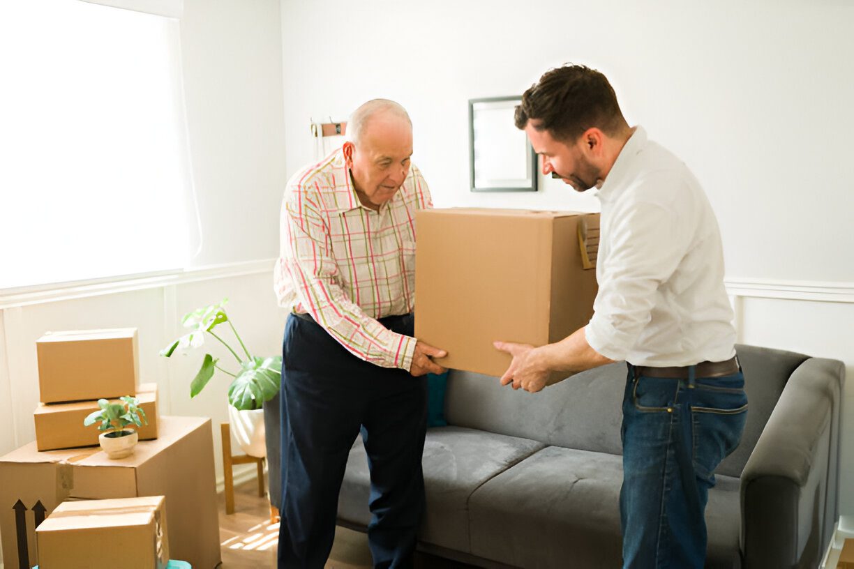 pixelcut-export (19) A man and an old man are moving boxes.