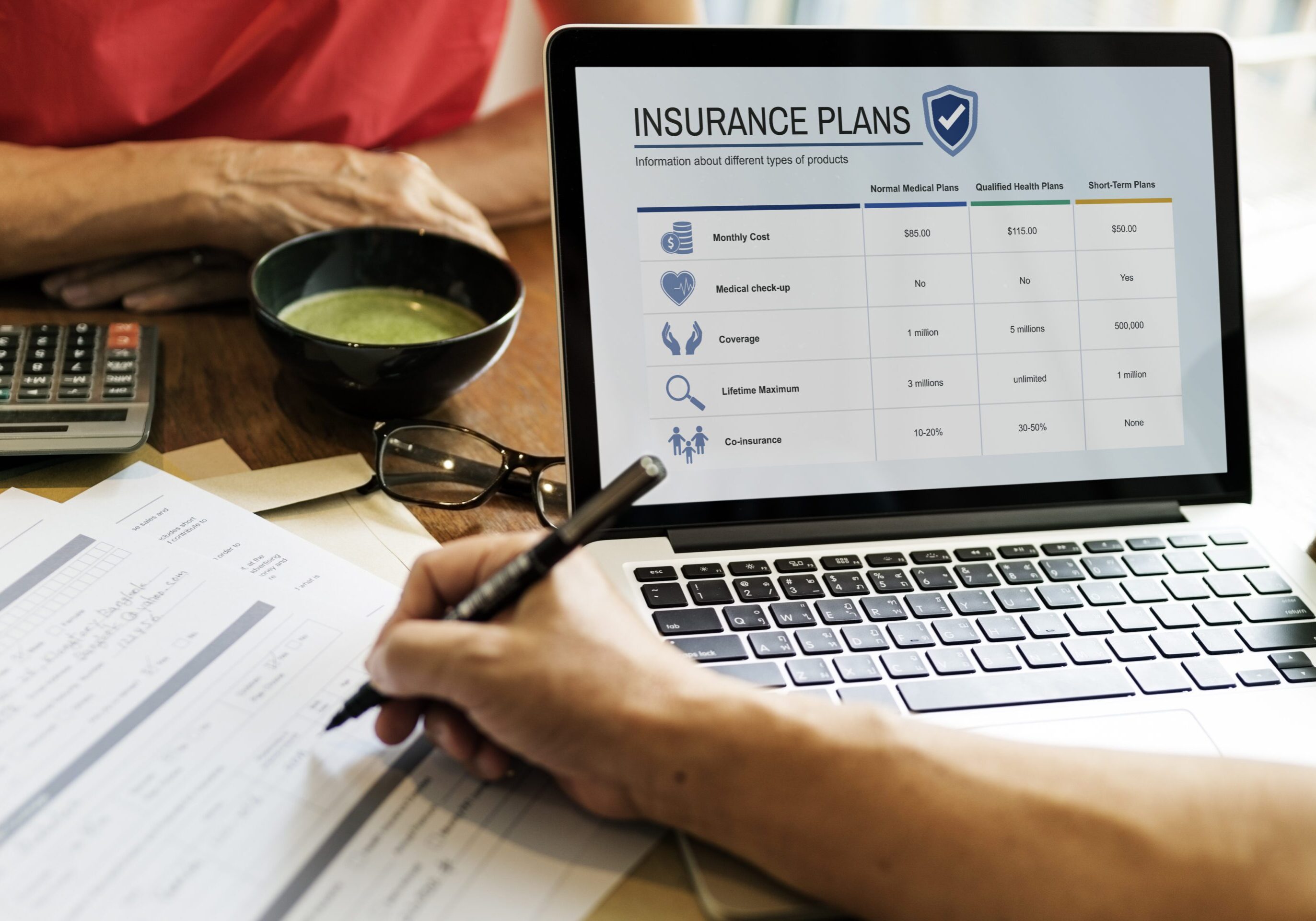 Senior Adult Life Insurance Healthcare Concept A person is using their laptop to check the insurance plans.